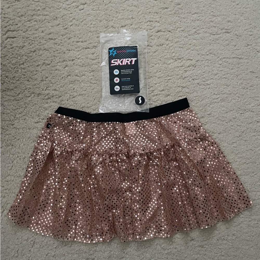 Sparkle Athletic running skirt. Rose gold color. Size small. New
